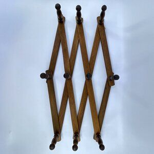 vintage wooden accordion wall mounted peg rack with 10 pegs